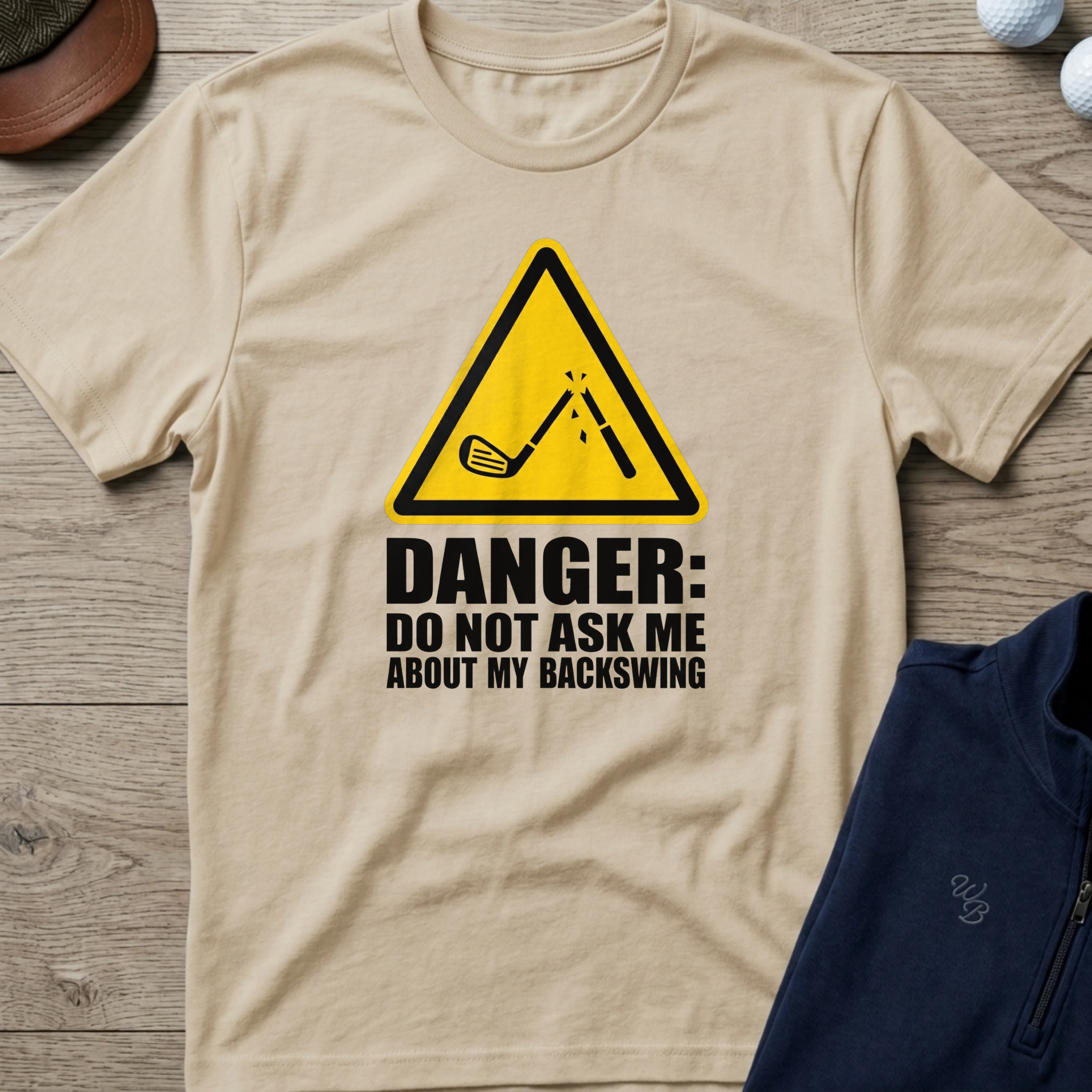 Don't Ask About My Backswing — Sand t-shirt